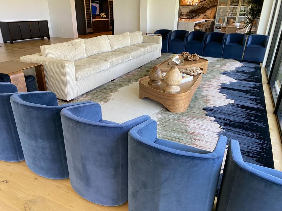 Custom blue velvet barrel chairs in a luxury Ponte Vedra living room